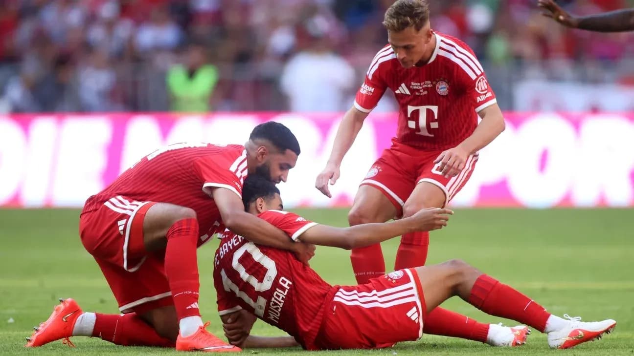 Bayern Munich players celebrating with Jamal Musiala