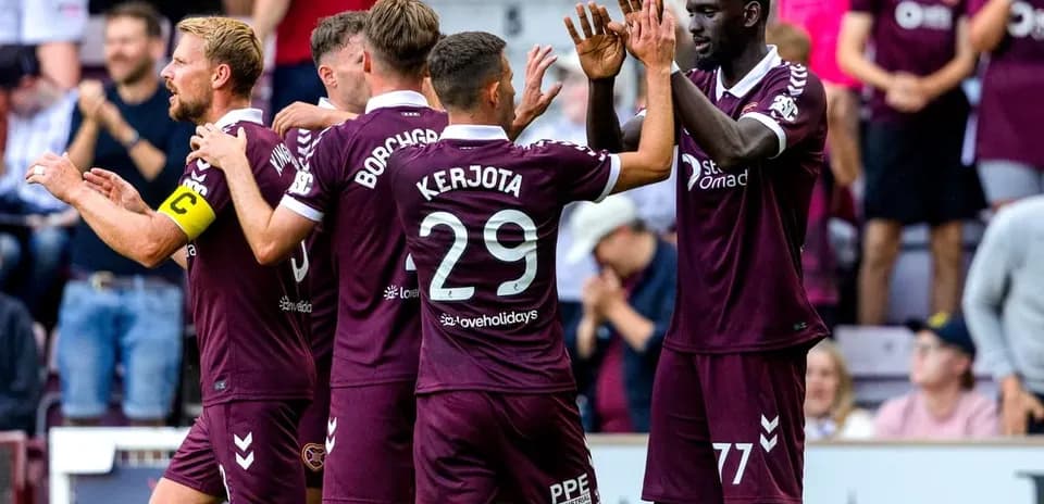 Hearts players celebrating a goal during match