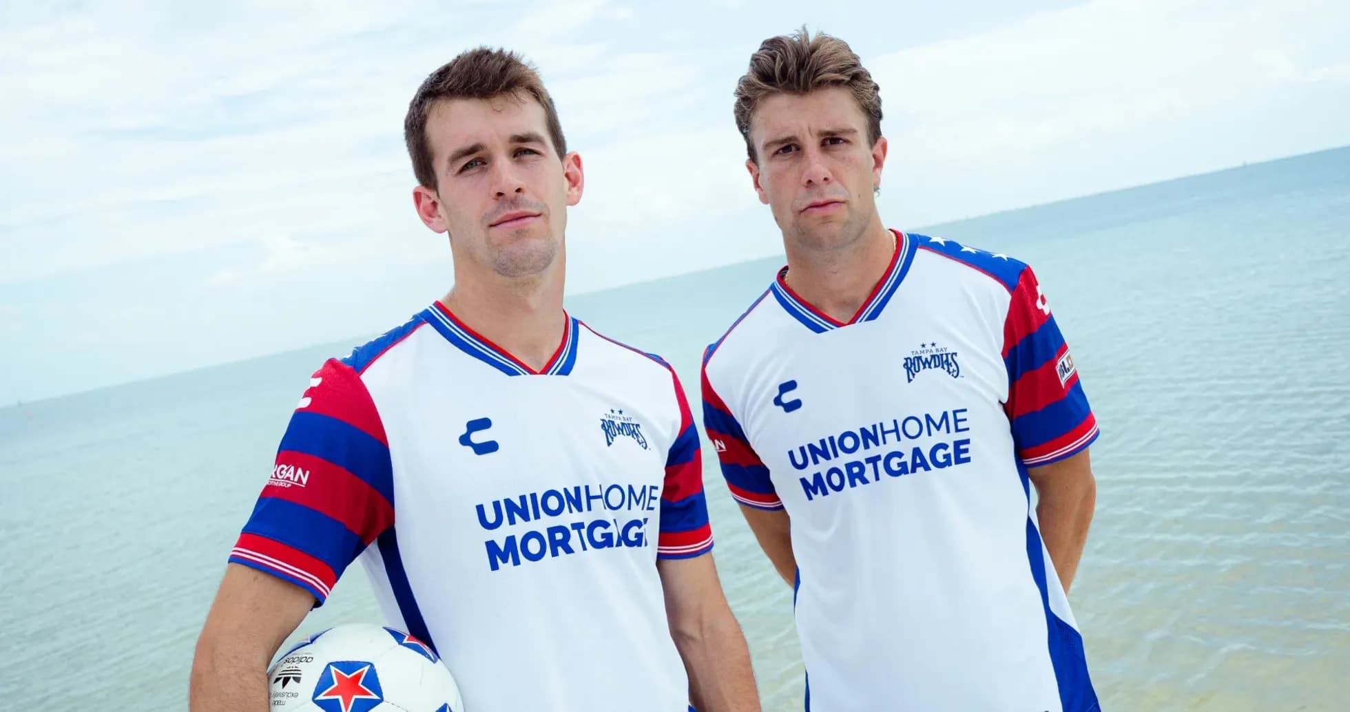 Tampa Bay Rowdies players posing by the beach