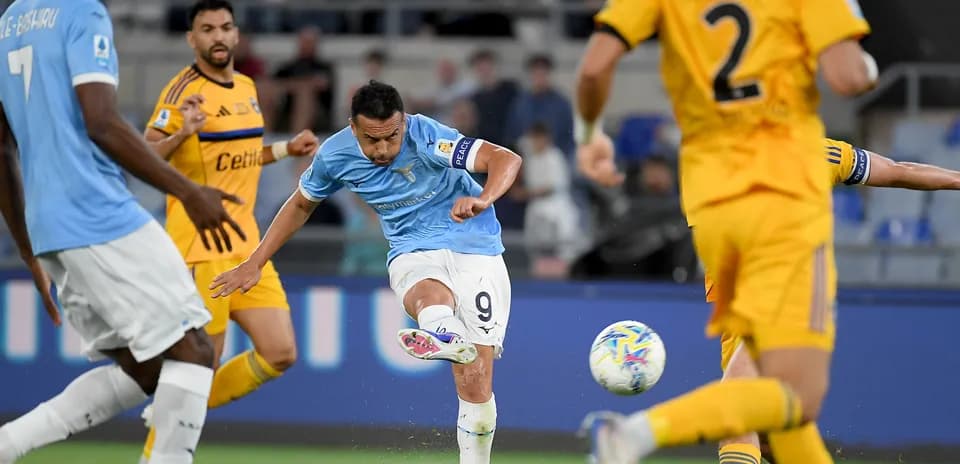 Lazio player kicking the ball during match