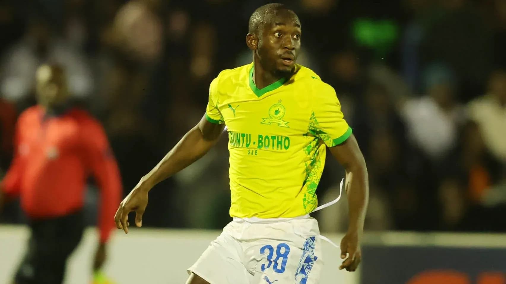 Player in yellow jersey during a match