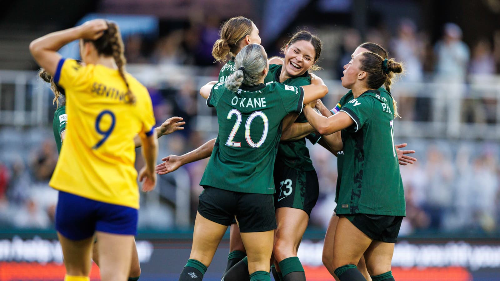 Players celebrating goal during Utah Royals match