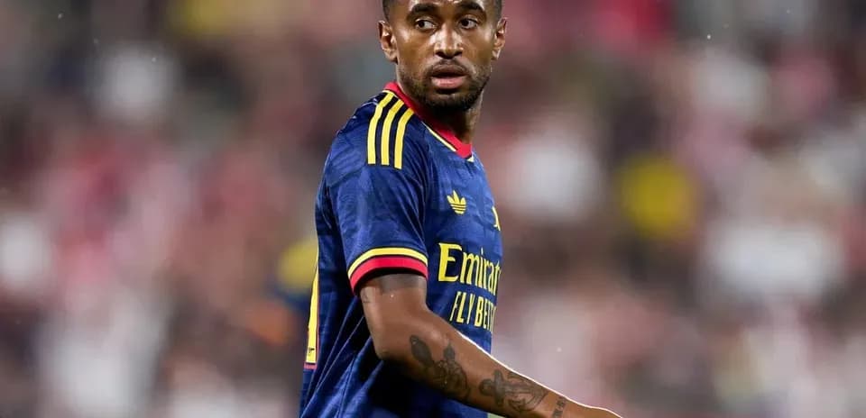 Player wearing Arsenal jersey on the field