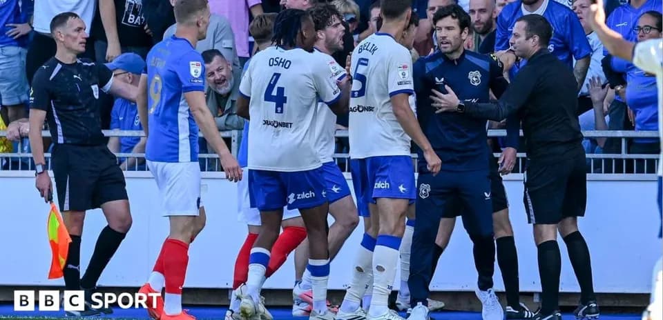 Players and officials arguing during a match incident
