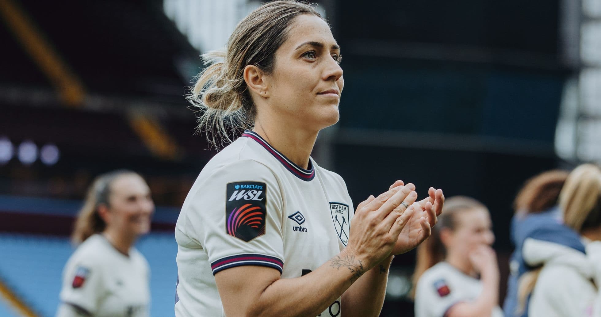 West Ham player applauding fans after match