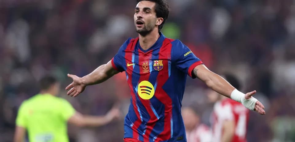 Player celebrating a goal in FC Barcelona jersey