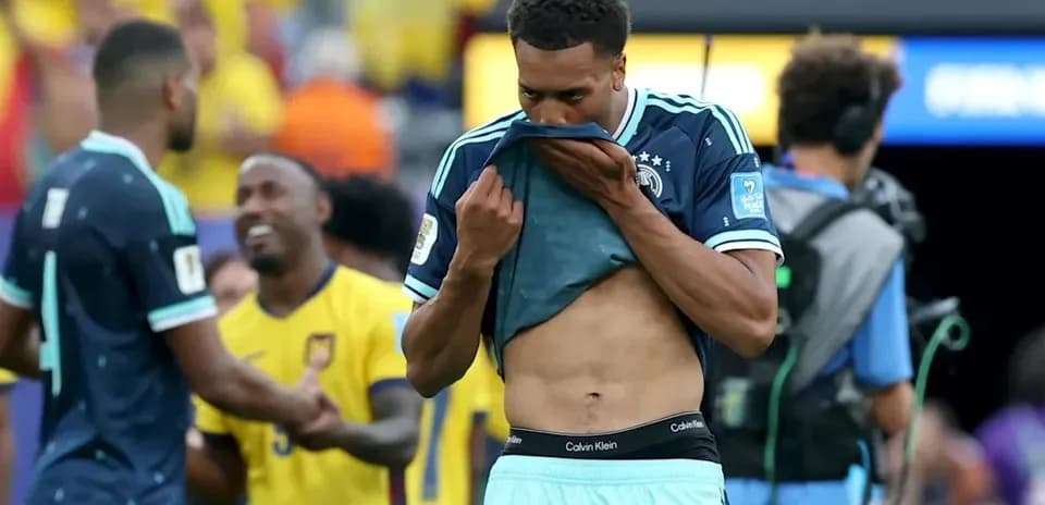 Player removing jersey after match with celebration