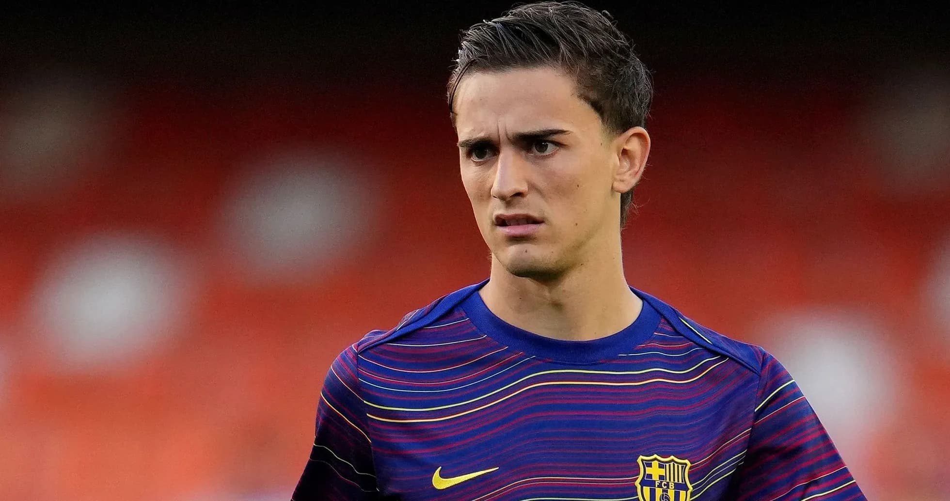 Player in Barcelona training kit on field