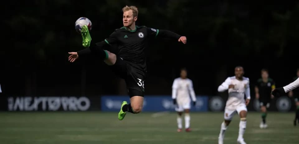 Player executing a kick during match