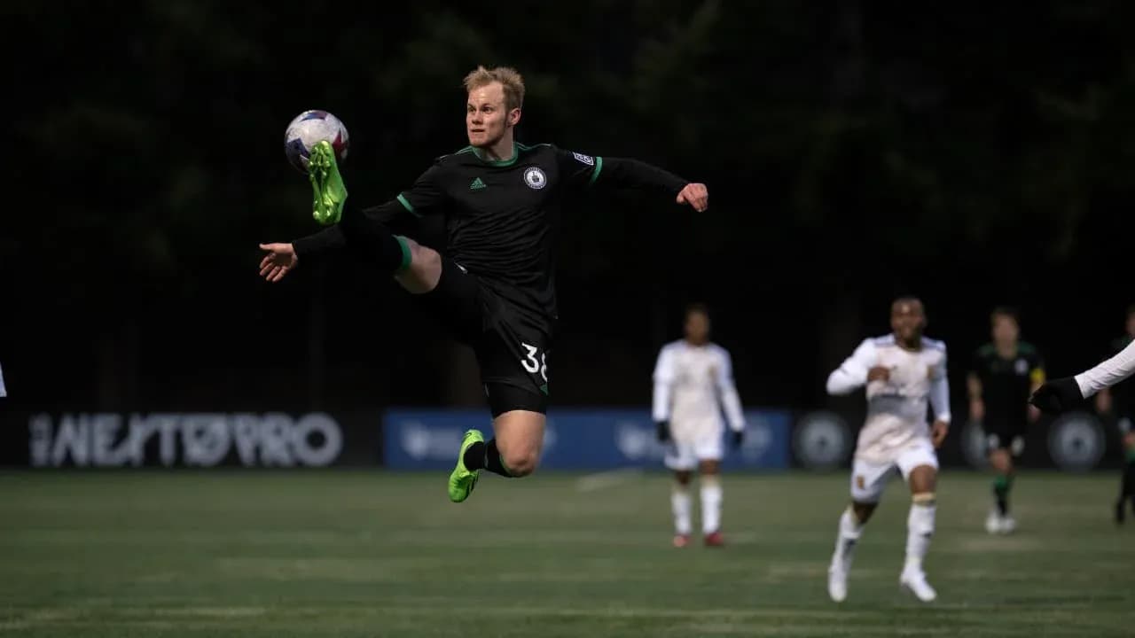 Player executing a kick during match