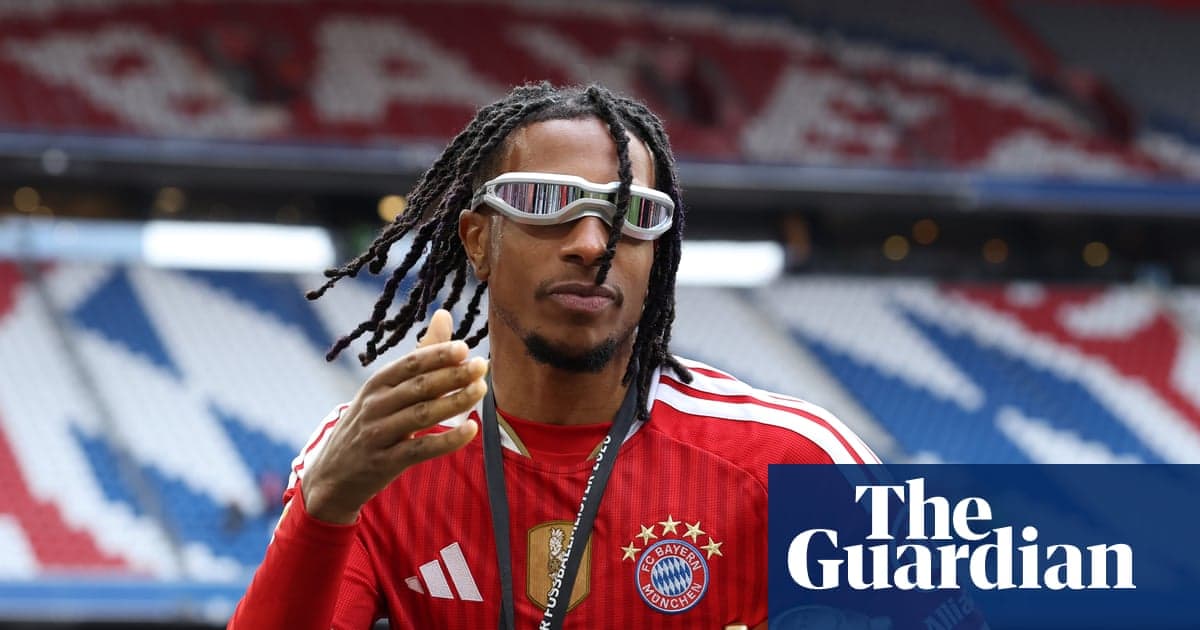 Player gesturing while wearing Bayern Munich jersey