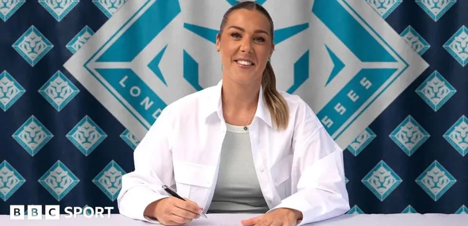 Athlete signing contract at press conference table