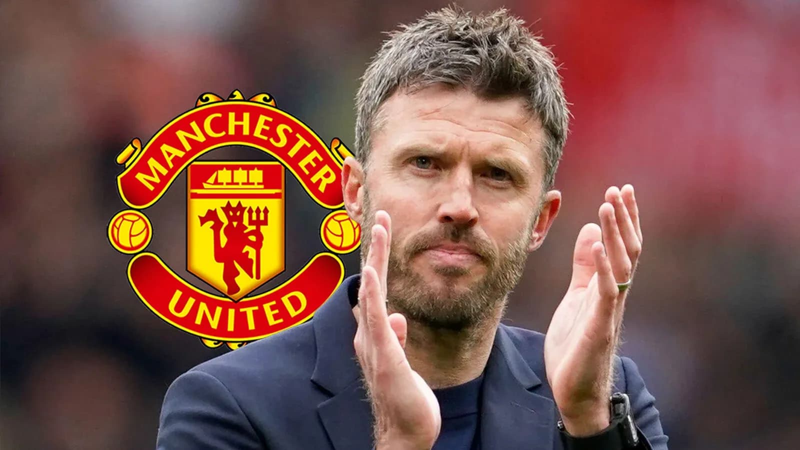 Coach clapping with Manchester United logo in background