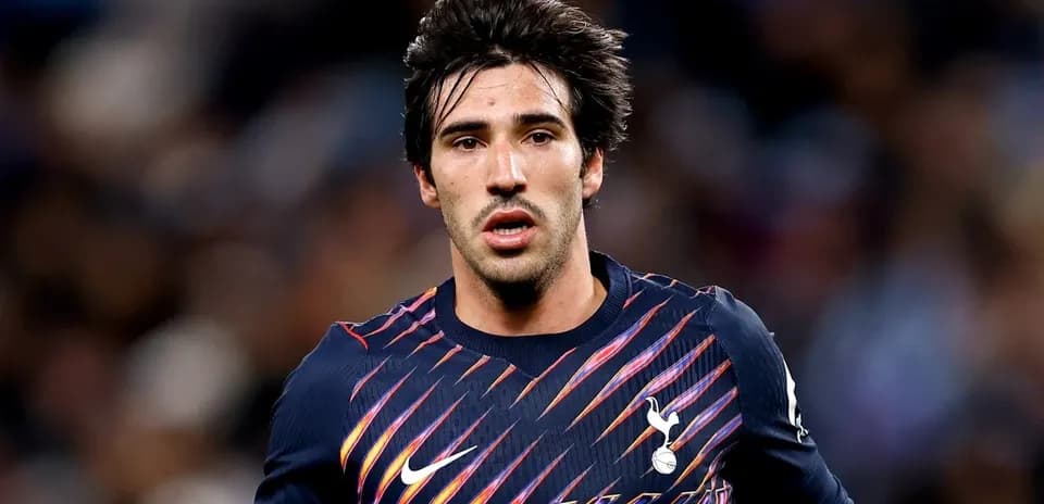 Player wearing Tottenham jersey during match action