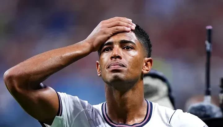 Player with hand on forehead during match