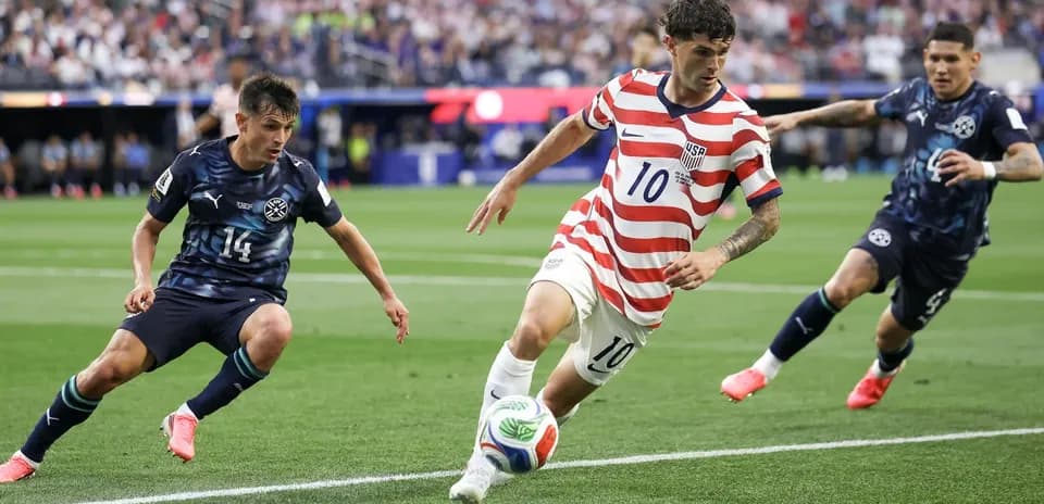 Player dribbling the ball during soccer match