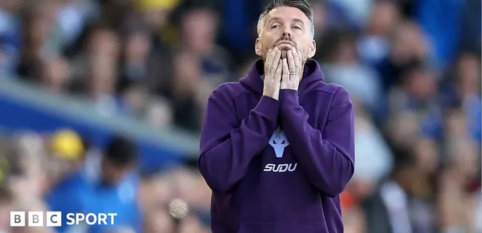Coach expressing concern during a match
