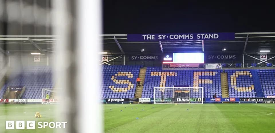 Empty stadium with 'STFC' displayed on seats