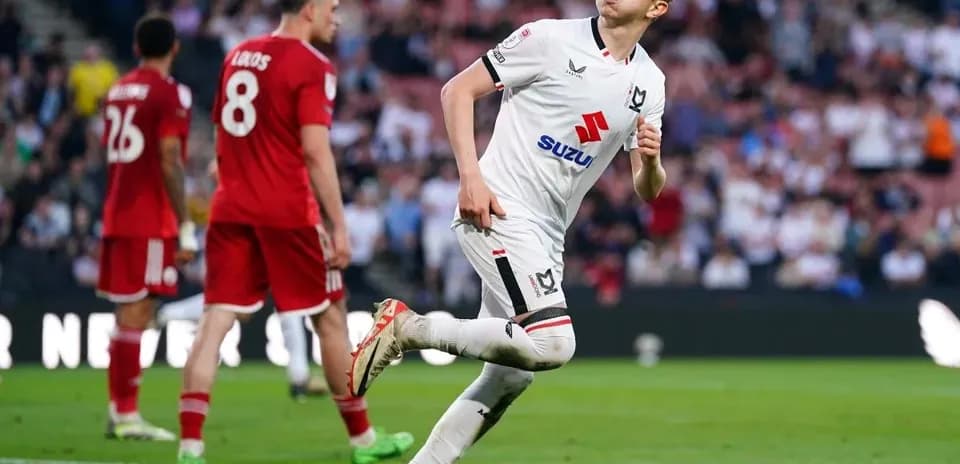 Player celebrating after scoring a goal during match