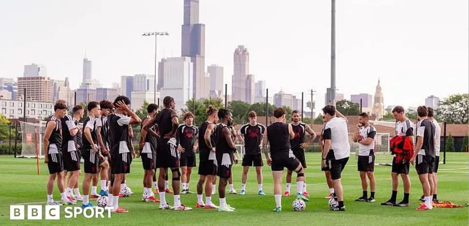 Soccer team gathered for training session outdoors