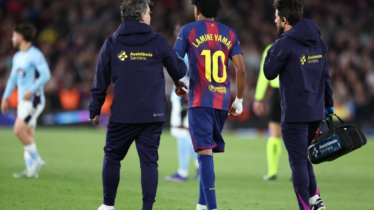 Player Lamine Yamal assisted off the field