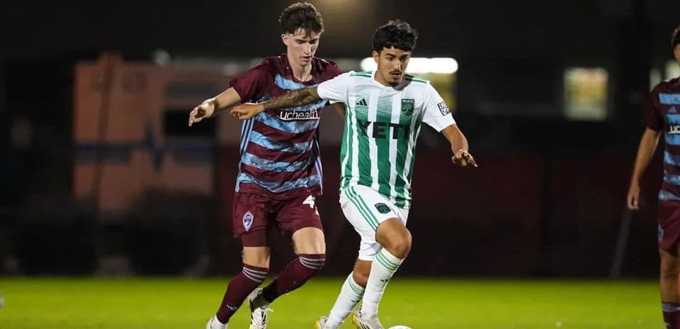 Colorado Rapids II player tackling Austin II player