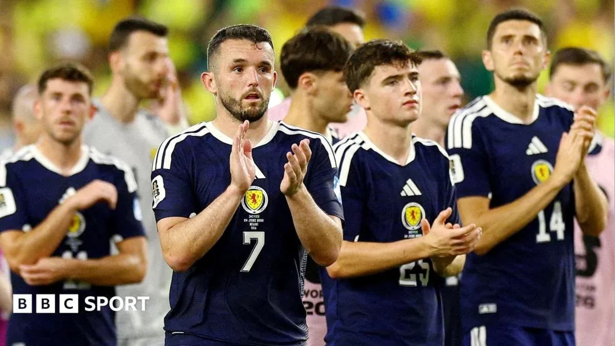 Scotland players applauding fans after match