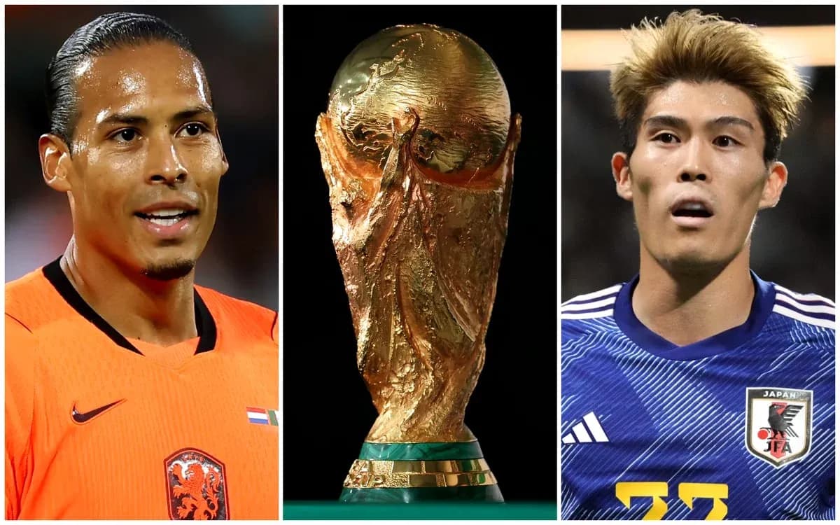 Virgil van Dijk and Japanese player with trophy