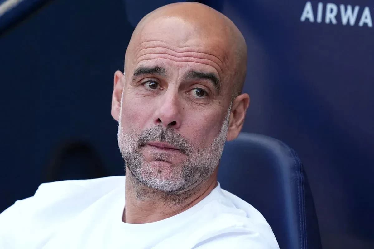 Coach sitting on bench during match