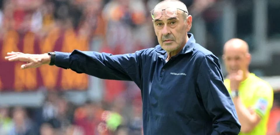 Coach gesturing during a football match
