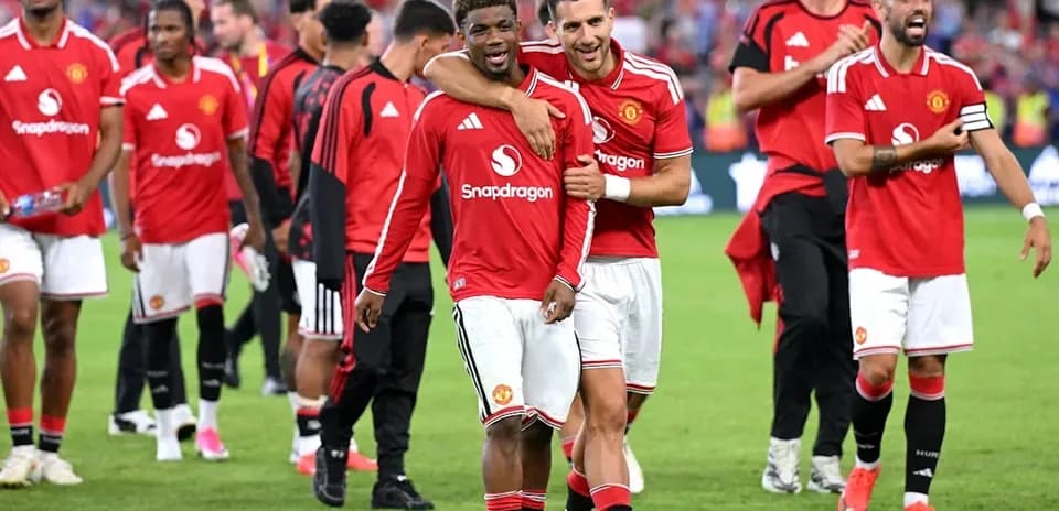 Manchester United players celebrating after the match