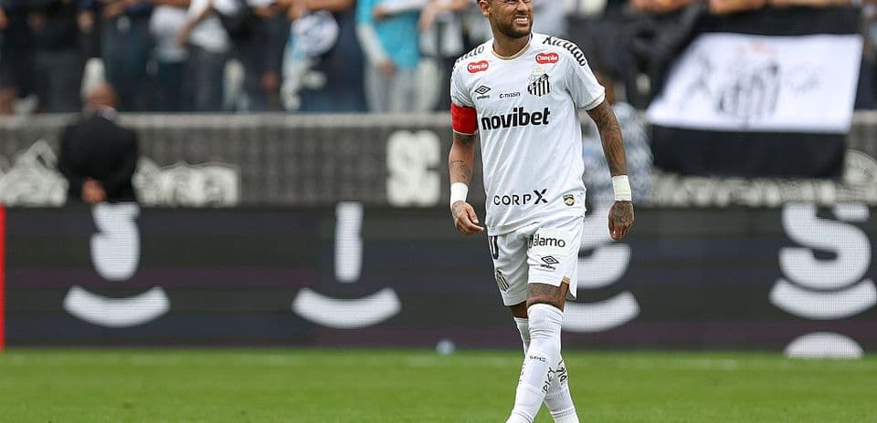 Player in white jersey celebrating on the pitch
