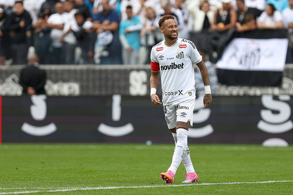 Player in white jersey celebrating on the pitch