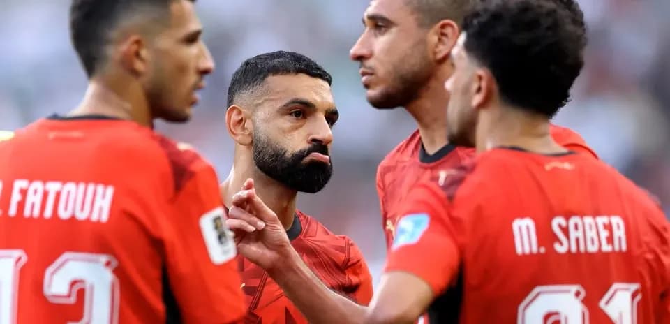 Egyptian players discussing during World Cup match