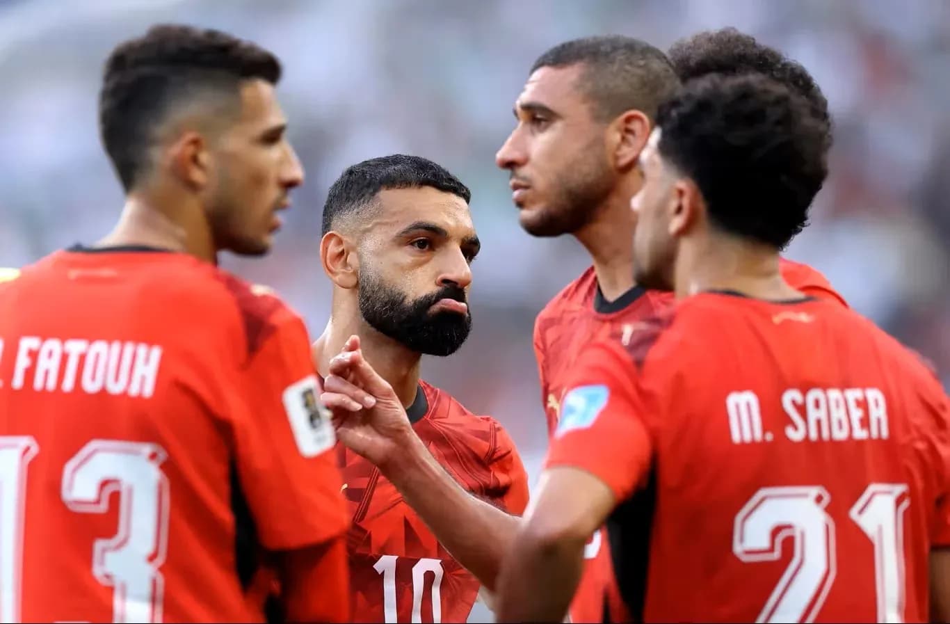 Egyptian players discussing during World Cup match