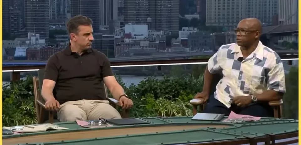 Two analysts discussing sports on a set