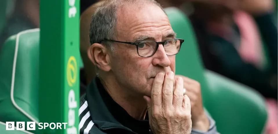 Coach observing the match from the sidelines