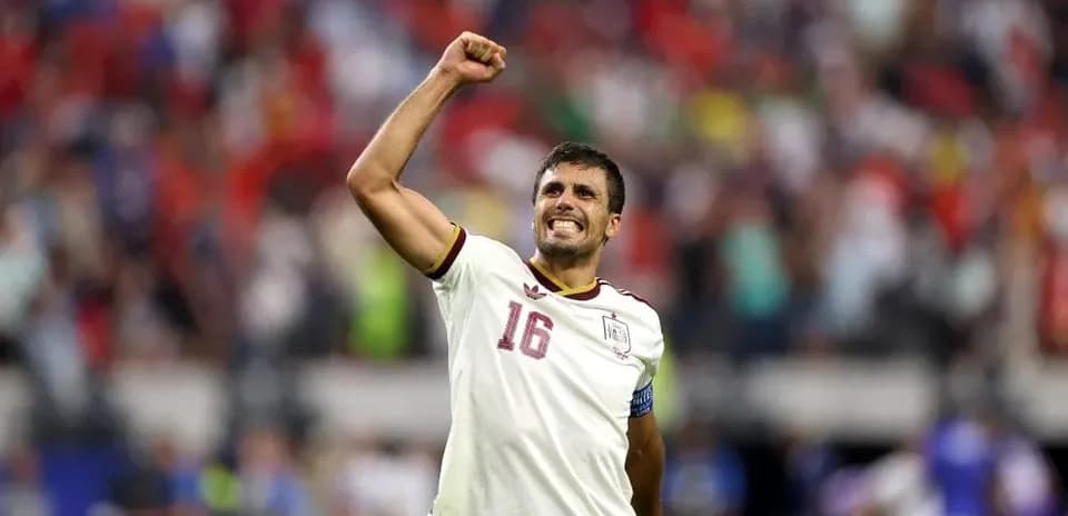 Player celebrating after scoring a goal during match