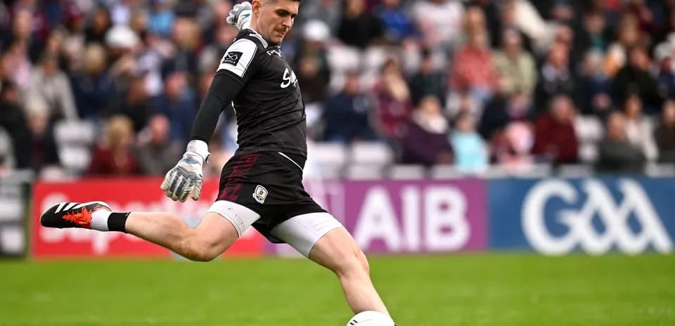 Goalkeeper kicking a ball during a match