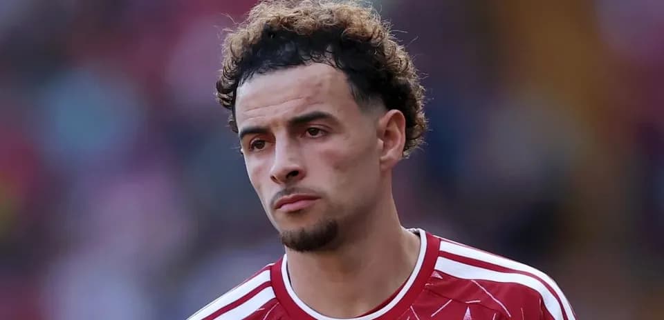 Player in red jersey during match
