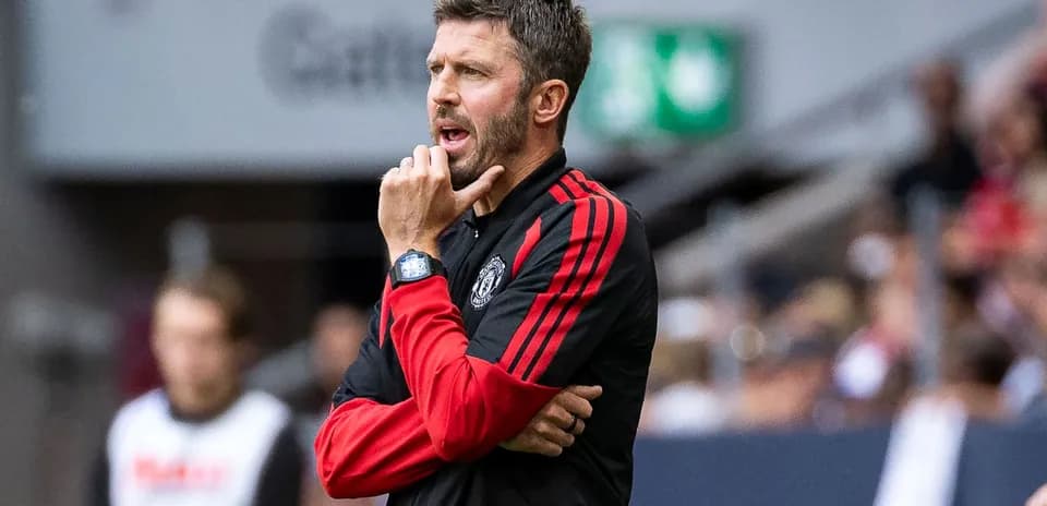 Coach giving instructions during match on sidelines