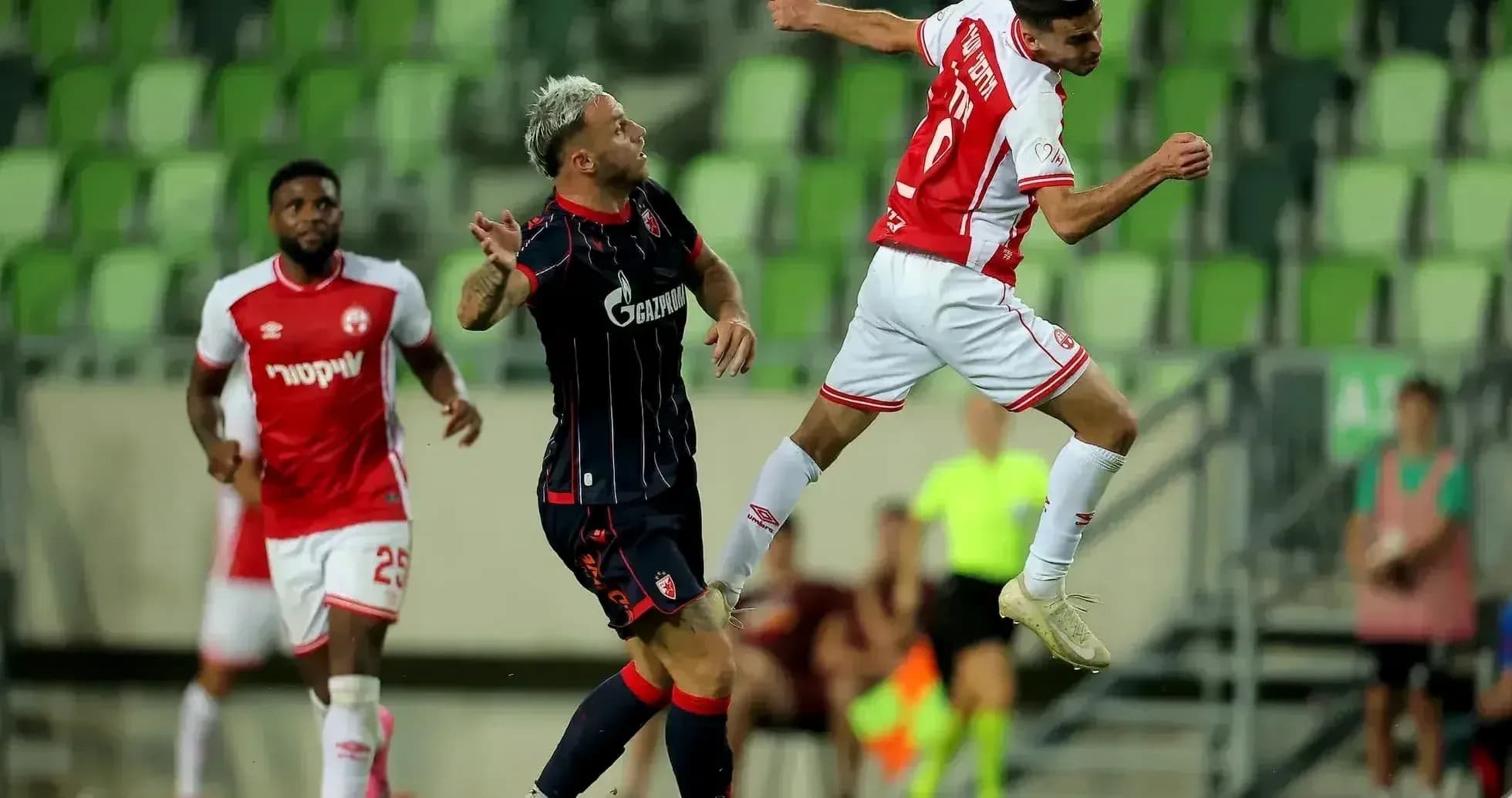 Player jumping for the ball during match