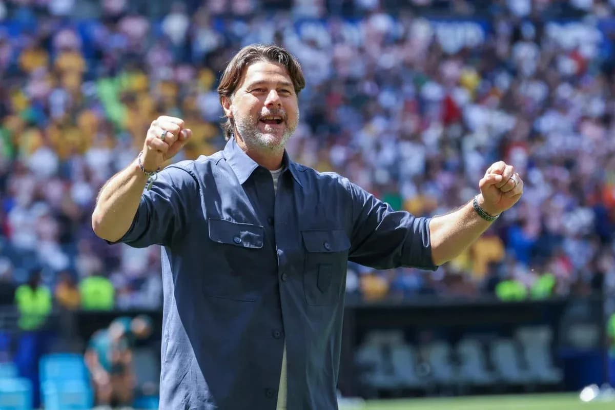Coach celebrating during a match in stadium