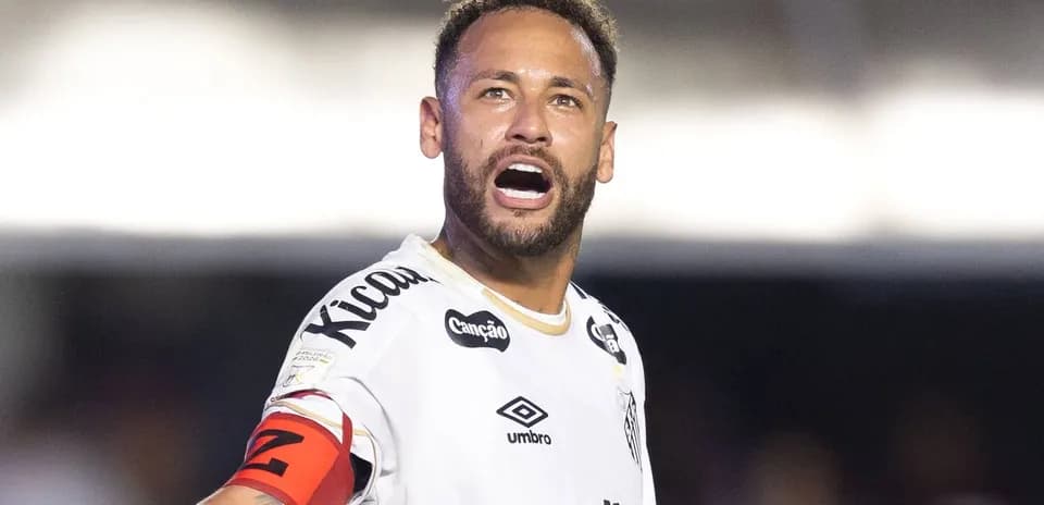 Player celebrating with captain's armband on field