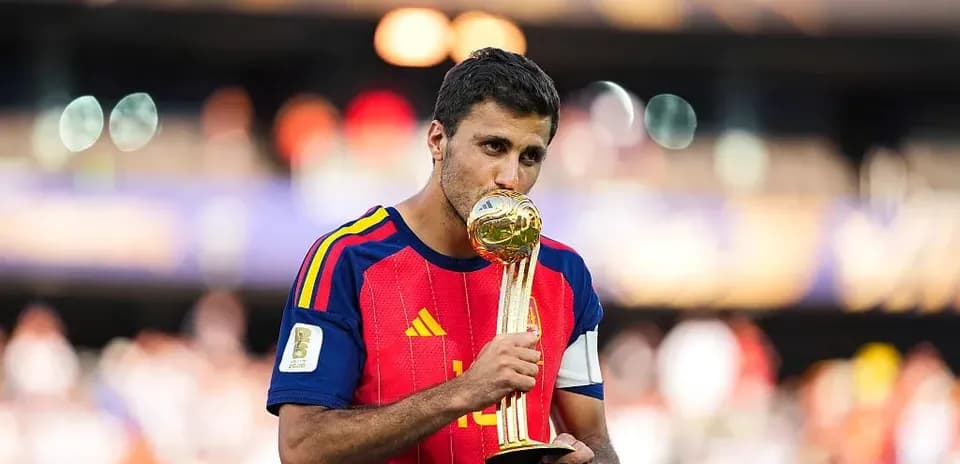 Player holding trophy after winning the match