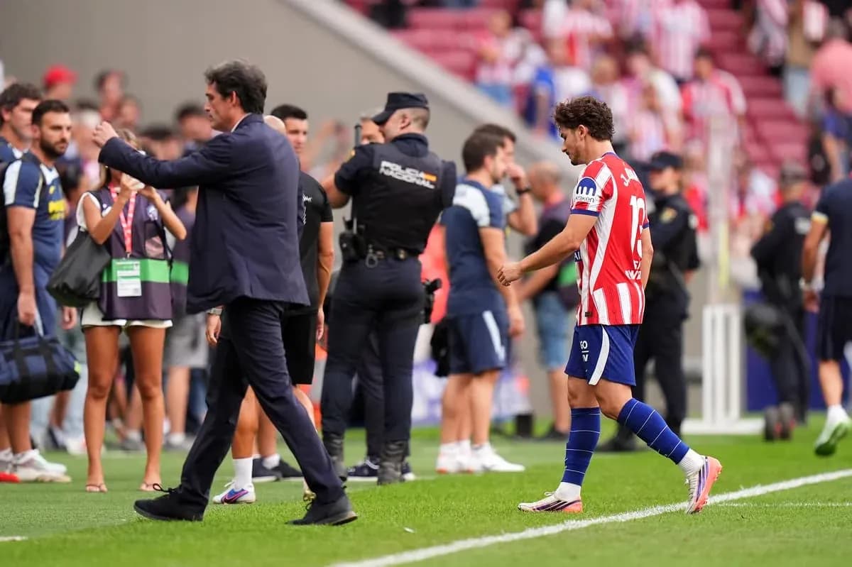 Player walking off field while coach gestures