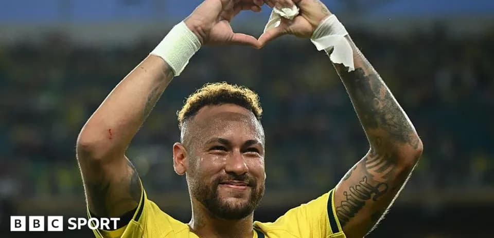 Neymar celebrating by making a heart shape