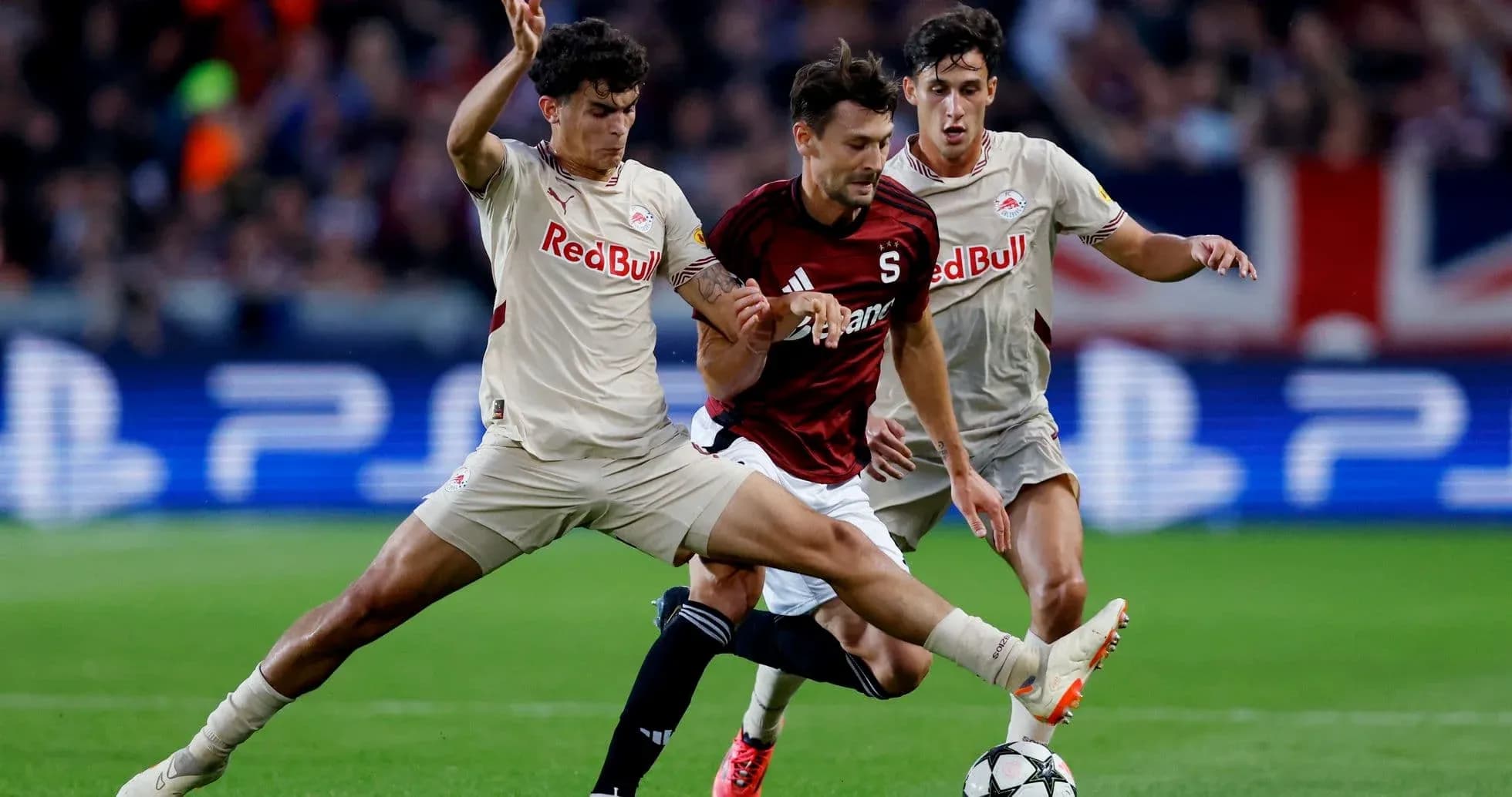 Players contesting the ball during Europa League match