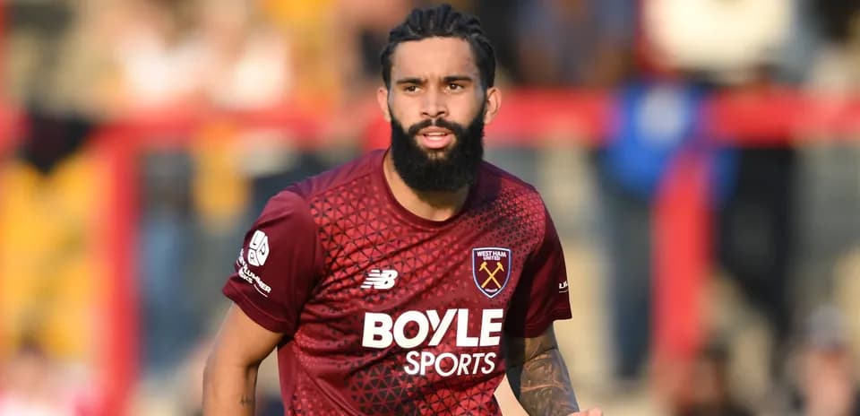 Player wearing West Ham United jersey on field