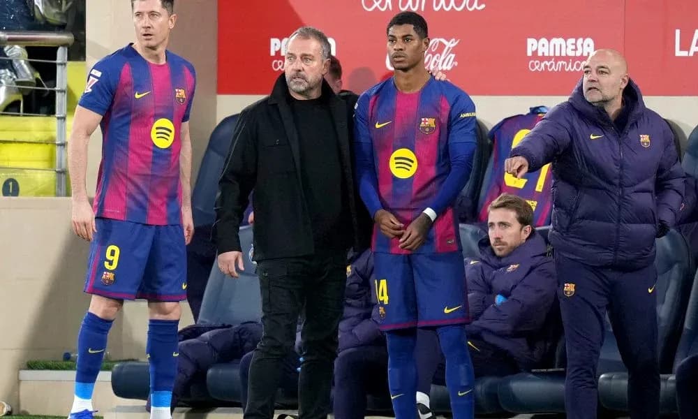 Barcelona players and staff on the bench during match